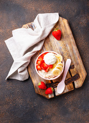 Oatmeal with strawberry, banana and ice cream