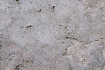 Old plaster on the wall. Close-up. Background. Texture.