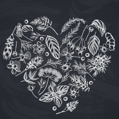 Heart floral design with chalk angelica, basil, juniper, hypericum, rosemary, turmeric