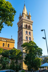 Fototapeta na wymiar Clock tower of Messina Cathedral (Italian: Duomo di Messina) in Messina city, Sicily, Italy. Clock tower has the largest astronomical clock in the world