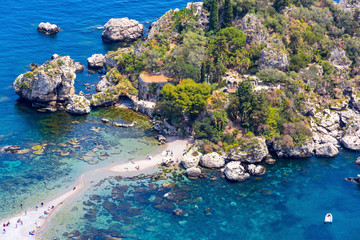 Aerial view of Isola Bella island and beach in Taormina, Sicily, Italy. Giardini-Naxos bay, Ionian sea coast. Isola Bella (Sicilian: Isula Bedda) also known as The Pearl of the Ionian Sea - obrazy, fototapety, plakaty