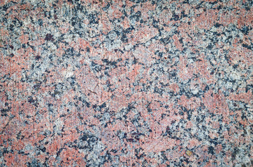 Surface of a granite stone, texture background