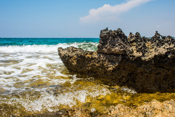 Fototapeta na wymiar stone in the form of a ship on the coast of Ayia Napa, Cyprus