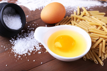 egg, flour, salt, ingredients for pasta penne bolognese