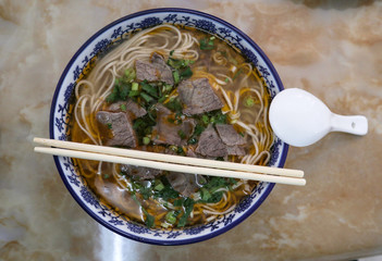 Beef Noodle Soup (La Mien) Chinese noodles cooked with gravy. The noodle is pulled when making it 