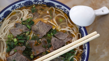 Beef Noodle Soup (La Mien) Chinese noodles cooked with gravy. The noodle is pulled when making it 