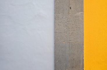 Fototapeta premium Wall panels in colors: yellow and gray, detail of modern house facade.