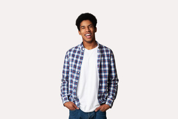 Afro Teenage Guy Posing with Hands in Pockets