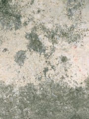 Rough gritty stone background or texture