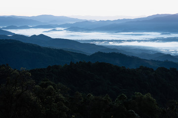 Rainy season of Thailand with landscape mountains and sky natural background.
