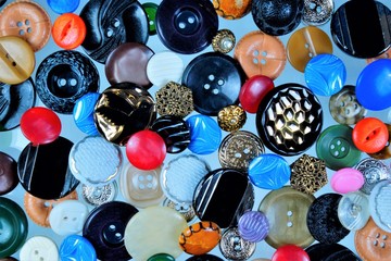 Buttons background for the design and creativity of the tailor. Button clasp on clothing, for the...