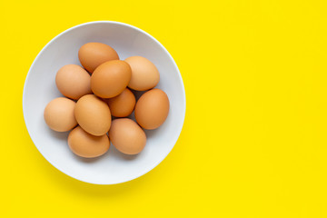 Eggs on yellow background.