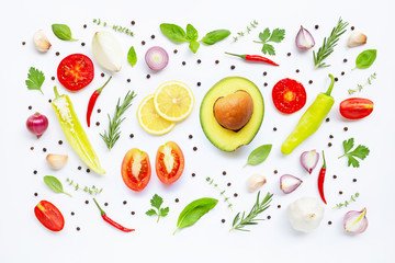 Various fresh vegetables and herbs on white background. Healthy eating concept