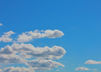 Fantastic soft white clouds against blue sky