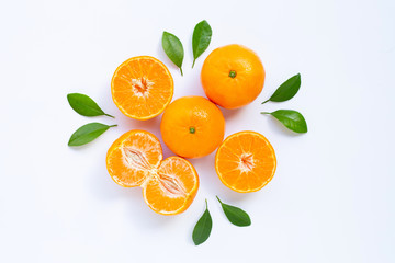 Fresh mandarin orange with leaves on white background.