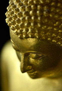 The face of the golden Buddha image at the temple