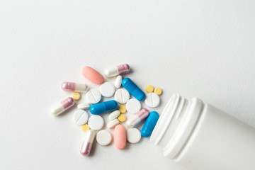 medicines pills vitamins pills health macro on white background, isolated. Copy space for text