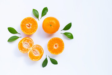 Fresh mandarin orange with leaves on white background.