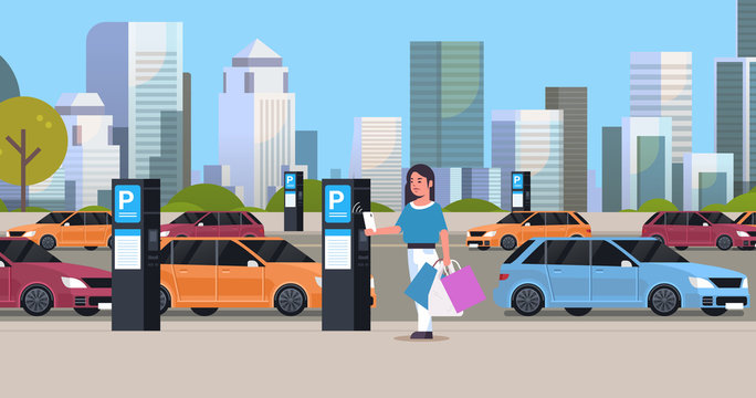 girl driver paying to parking place by smartphone at pay station ticketing machine nfc payment system concept modern cityscape background flat full length horizontal
