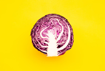 Fototapeta premium Fresh of purple cabbage (half sliced)on color background