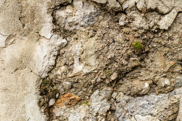 Texture, wall, concrete, it can be used as a background. Wall fragment with scratches and cracks