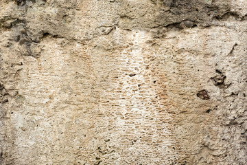Texture, wall, concrete, it can be used as a background. Wall fragment with scratches and cracks