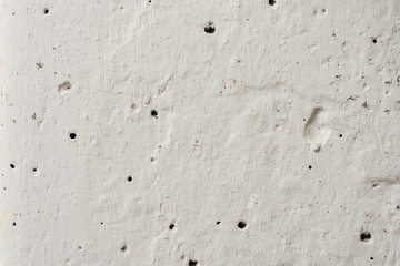 Texture, wall, concrete, it can be used as a background. Wall fragment with scratches and cracks