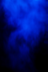 Blue smoke and light shining, the smoke on black abstract background