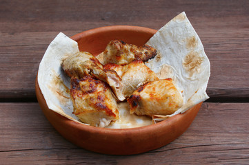 Georgian food. Grilled chicken on skewers (chicken shashlik). Popular dish of Georgian cuisine.