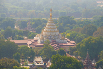 View of the Buddhist temple Kyauktawgyi Pagoda in the early morning. Mandalay, Myanmar