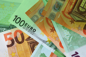 One Hundred and Fifty euro banknotes green color toned close up
