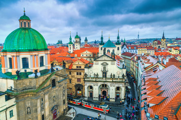 Fototapeta na wymiar Spectacular Prague cityscape with colorful house roofs and towers, Europe