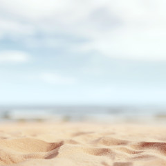 Summer tropical sand beach and bokeh sun light on sea background, copy space.