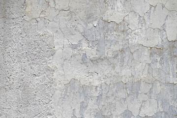 texture of old concrete wall with cracked paint