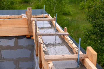 Foundation site of new house, building, details and reinforcements with steel bars