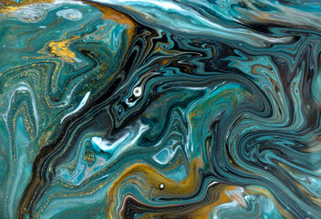 Bronze, blue and gold marbling pattern. Golden marble liquid texture.