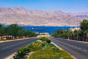 Eilat Israeli city nature scenic landscape photography of car road way down to Gulf of Aqaba Red...