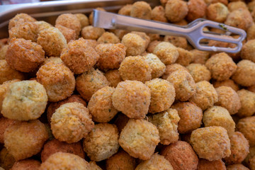 Falafel (or felafel) a deep-fried ball made from ground chickpeas or fava beans