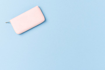 Overhead shot of pink purse. Fashion background