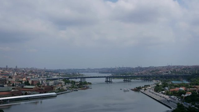 Aerial view on bridge across the Bosphorus river and Istanbul beautiful cityscape in evening. Time lapse Turkey