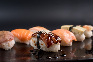 sashimi sushi set on black background
