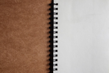 Brown note book that opens
