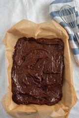 home made chocolate brownies with raspberries and streusel