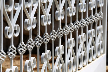 Metal fence. Metal curly fence in the park