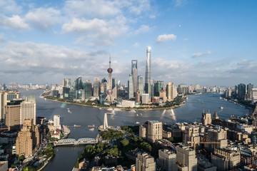 aerial view of Lujiazui, Shanghai city, landmarks of Shanghai with Huangpu river in the afternoon