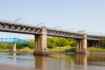 Fototapeta na wymiar The King Edward VII railway bridge over the River Tyne. The bridge connects Newcastle upon Tyne and Gateshead.