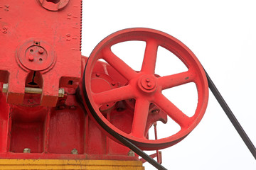Fototapeta premium red wheel of mechanical equipment