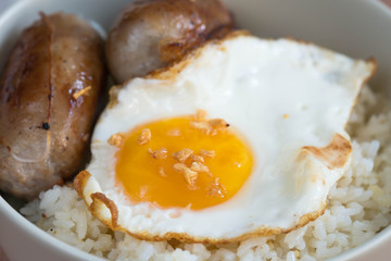 longgasilog, Filipino style hotdog with egg on top of garlic rice is one of favorite dishes of Filipinos 