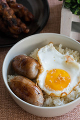 longgasilog, Filipino style hotdog with egg on top of garlic rice is one of favorite dishes of Filipinos 