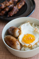 longgasilog, Filipino style hotdog with egg on top of garlic rice is one of favorite dishes of Filipinos 